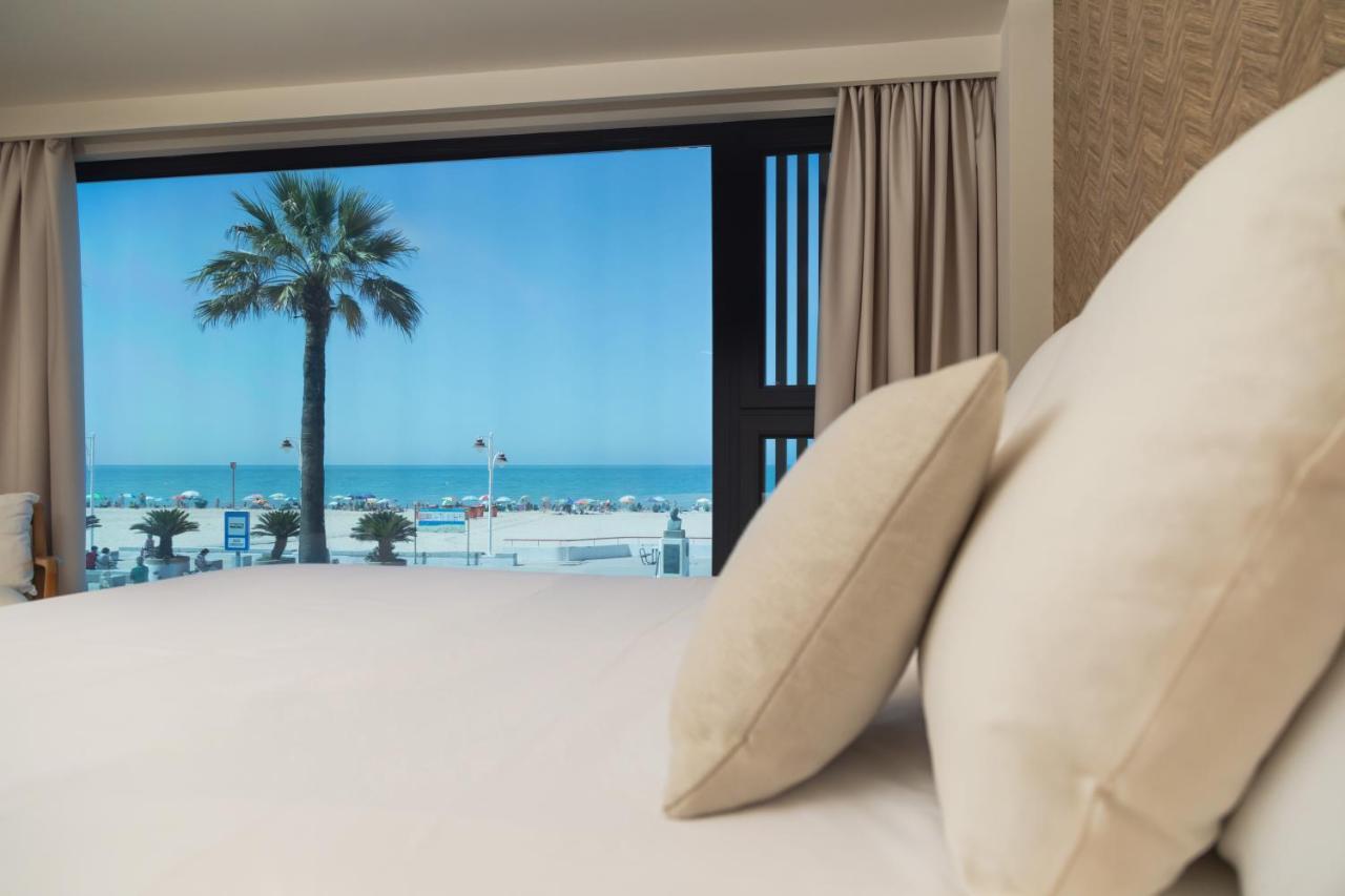 Apartamentos Playa Victoria Кадис Экстерьер фото